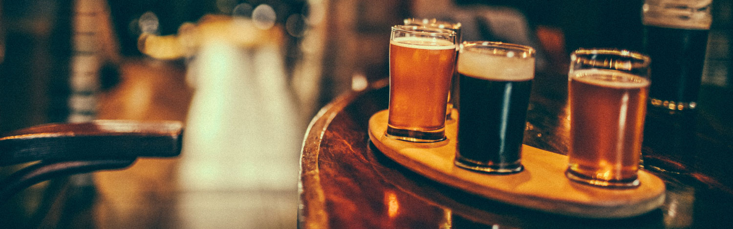 Variety of beers in a pub.