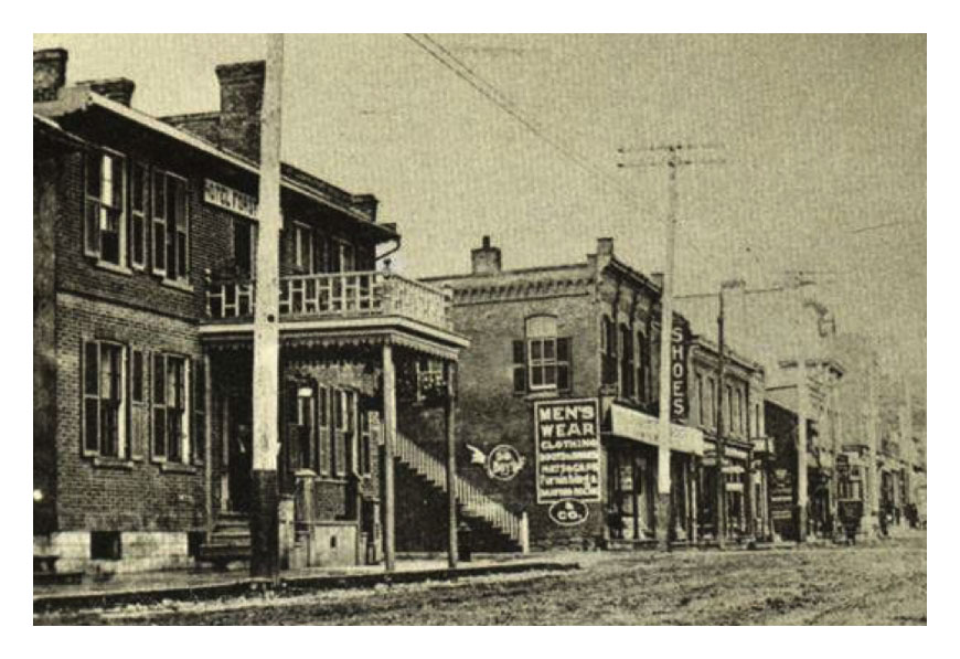 The History Hound & Grey Coach Facebook pages. This photo must date pre-1910 - when the renovations were done and the new sign hung. You can see that it is still called the Hotel Forsyth here. You can also see a very small portion of the original bar room with hotel rooms above in the extreme left of the photo.